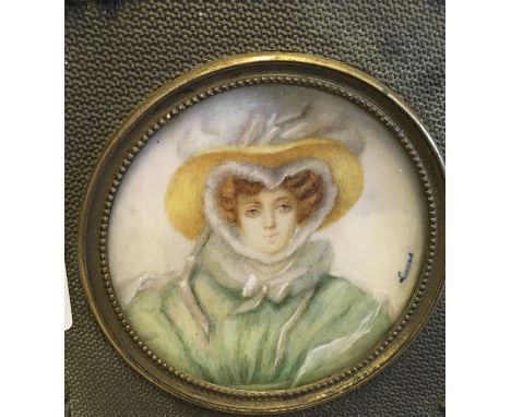 Small circular portrait miniature, signed Cocas? head and shoulders of a 17th century lady
