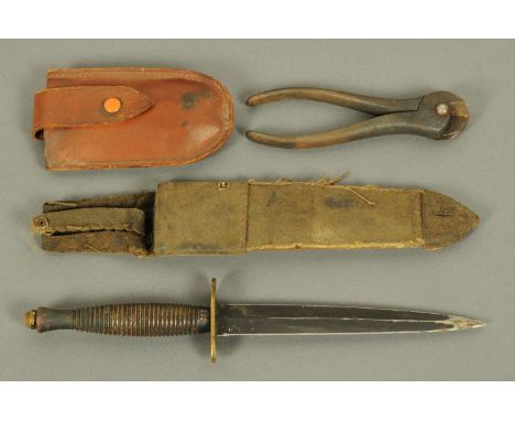 A Second World War Commando knife, with canvas sheath, and a pair of Commando wire cutters (see illustration).   CONDITION RE