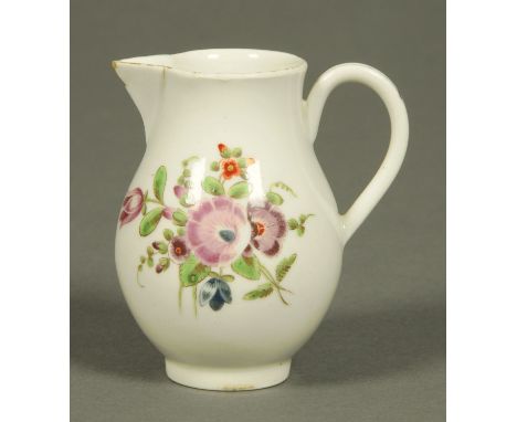 A Worcester sparrow beak jug, polychrome, decorated with flowers.  Height 9 cm.  CONDITION REPORT: This jug has a small chip 