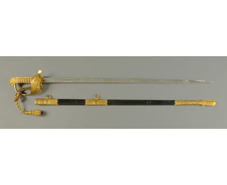 An Elizabeth II naval dress sword, by Wilkinson Sword, Serial No. 98034, with leather and brass scabbard.  Overall length 95 