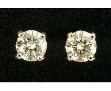 A pair of 18 ct white gold diamond stud earrings, combined diamond weight approximately .64 carats.  CONDITION REPORT: These 