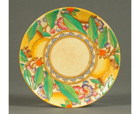 A Charlotte Rhead Bursley Ware tube lined plate, decorated in bright enamel colours with fruit and foliage.  Diameter 22 cm (