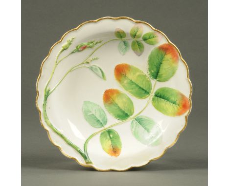 A Worcester Blind Earl pattern fluted fruit dish, decorated in shallow relief with stem of wild rose.  Diameter 20 cm. 