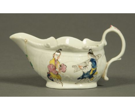 A Worcester silver shaped sauce boat, polychrome, decorated with Oriental figures, circa 1760.  Length 13 cm.  CONDITION REPO