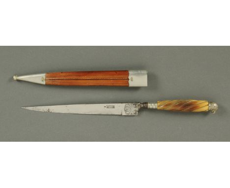 An antique gaucho knife, with leather scabbard, parrot head terminal and bone handle, blade marked "F. Herder, Solingen".  Le