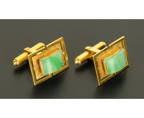 A pair of Chinese jade and 14 ct gold cufflinks.