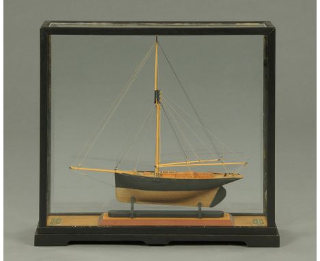 A scale model of the yacht Foam, by W. Malcolm Wilson 2010, in glazed case.  Case length 58 cm, height 53 cm.  CONDITION REPO