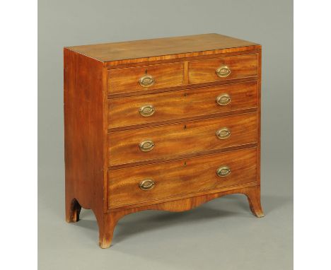 A Regency mahogany ebony strung chest of drawers, two short and three long drawers with later brass drop handles with oval ba