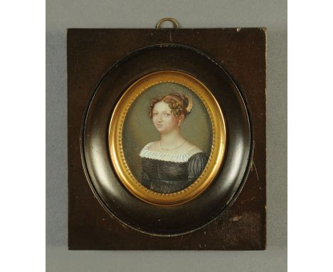 19th century portrait miniature, female figure with black blouse with lace collar.  Miniature 64 mm x 52 mm, with brass slip 