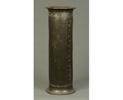 An Arts & Crafts planished copper stick stand.  Diameter 24.5 cm, height 67 cm.  CONDITION REPORT: This stick stand is in str