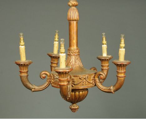 An early 20th century gilt painted wooden five branch centre light fitting, decorated with swags.  Height excluding chain 64 