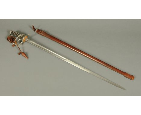 A George V dress sword, with engraved blade, shagreen wire bound grip and leather covered scabbard oil cloth cover. (see illu