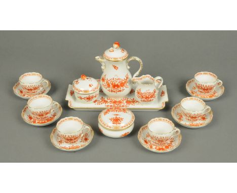 A Meissen coffee service, comprising coffee pot, two sugar basins, milk jug, cake plate, six cups and saucers (see illustrati