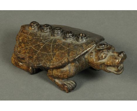 A Chinese carved jade tortoise.  Length 19.5 cm.  CONDITION REPORT: There are no repairs or restoration to this piece. There 