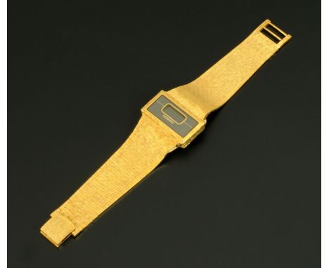 A gentleman's Rotary digital watch, with gold plated bracelet, circa 1970. 
