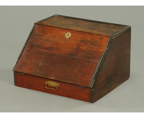 A George III mahogany slope front clerk's desk, with fitted interior.  Width 56.5 cm. 