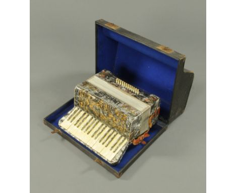 A Belazani piano accordion, cased.