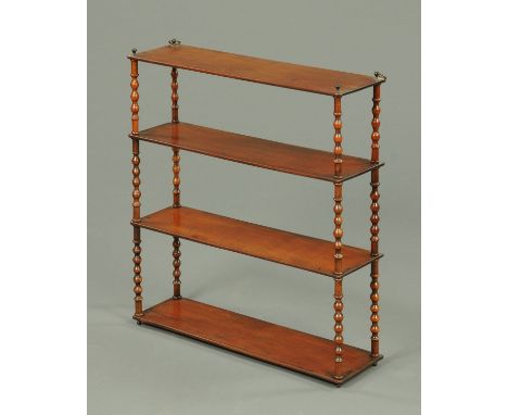 A 19th century mahogany four tier open shelf unit, with bobbin turned supports between each shelf.  Width 65 cm.   CONDITION 