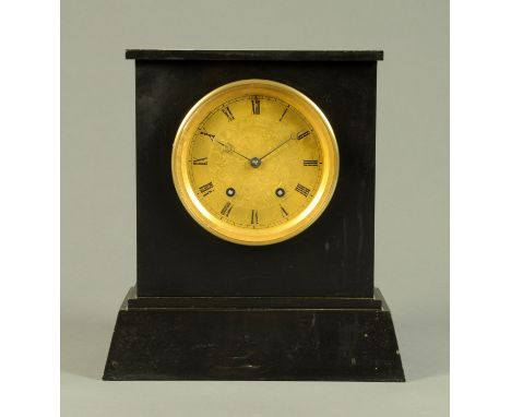 A late 19th century black slate two-train mantle clock, with circular foliate engraved dial and with Roman numerals to the ch