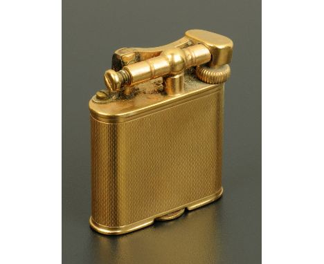 A 9 ct gold Dunhill pocket cigarette lighter.  Height 42 mm, width 36 mm (see illustration).  CONDITION REPORT: There are sma