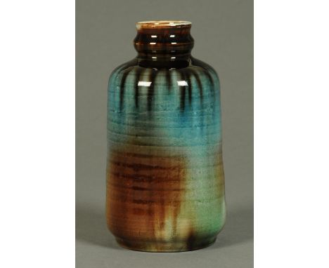 A Minton Secessionist vase, brown, black and blue glazed, ribbed body, impressed mark.  Height 20 cm.  CONDITION REPORT: No d