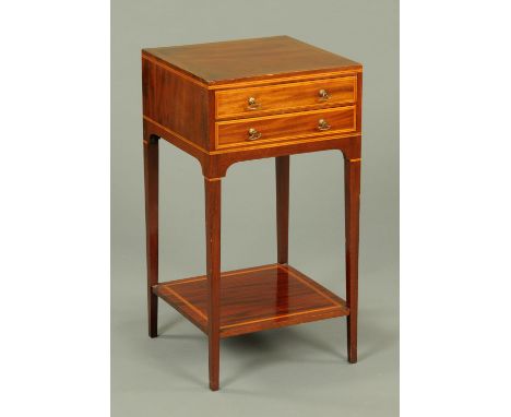 An Edwardian inlaid mahogany side table, fitted with two frieze drawers with brass drop handles and boxwood stringing, raised