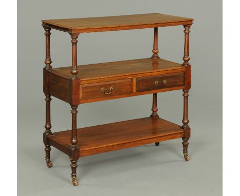 An Edwardian walnut dumbwaiter, the rectangular top with moulded edge supported by turned columns, with two drawers and with 