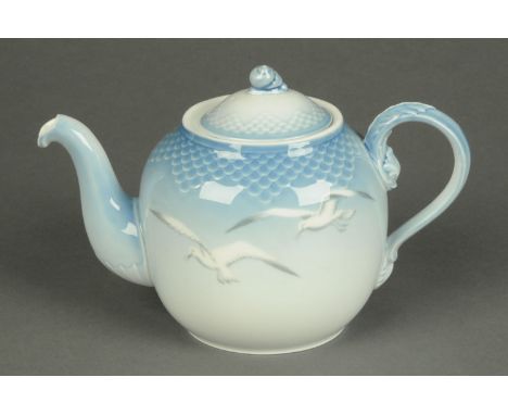 A Bing & Grondahl teapot, with scale and gull pattern, green printed mark.  Length 26 cm (see illustration).  CONDITION REPOR