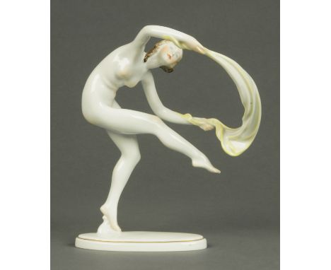 A Herend dancing female figure, blue printed mark.  Height 22.5 cm (see illustration).  CONDITION REPORT: First class conditi