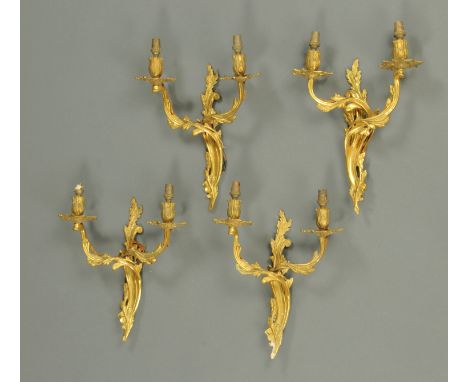 A set of four Rococo style side light fittings, two branch.  Height 38 cm. 