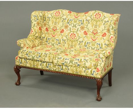 A mahogany Chippendale style two seater settee, with front carved cabriole legs (see illustration). CONDITION REPORT: The cus