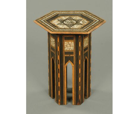 A late 19th century Moorish inlaid mother of pearl table, octagonal, walnut and ebonised.  Width 41.5 cm. 