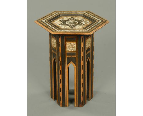 A late 19th century Moorish inlaid mother of pearl table, octagonal, walnut and ebonised.  Width 41.5 cm. 