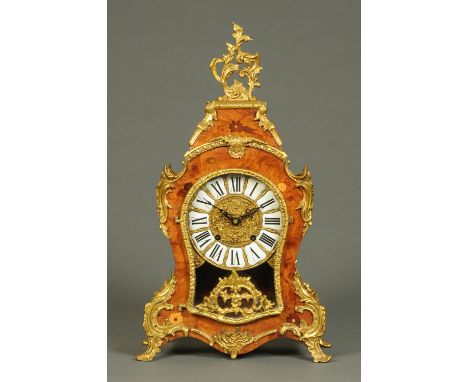 A Louis XV style floral marquetry and walnut cased bracket clock, with gilt brass mounts.  Height 60 cm, width 33 cm (see ill