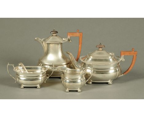 A George V four piece silver tea service, teapot, hot water jug, sugar basin and milk jug, Birmingham 1932, also stamped "Ric