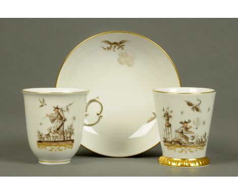 A Meissen 1996 Anniversary Heroldt Chinoiserie beaker, cup and saucer, all with blue crossed swords mark and gilt signature. 