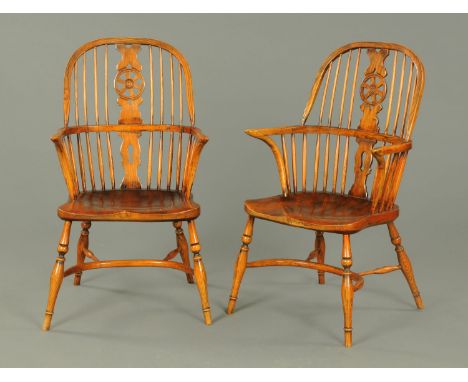 A pair of Windsor armchairs, with wheel splat backs, solid seats and crinoline stretchers (see illustration). CONDITION REPOR