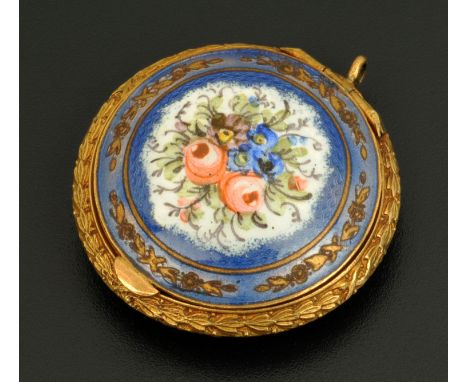An early 19th century enamel and gilt metal circular patch box, inscribed to the inner edge of the lid "Waterloo".  Diameter 