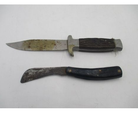 A vintage hunting style knife, the blade stamped "Inox" along with a folding penknife
