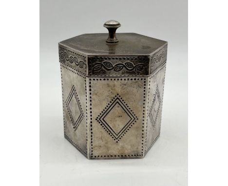 A silver plated hexagonal tea caddy with pierced decoration 