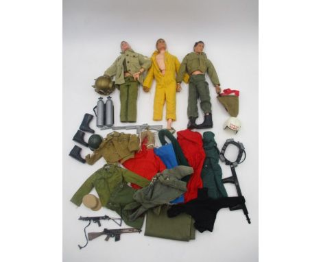 A collection of three vintage Action Man figures, all dated 1964 (A/F), along with selection of accessories and clothing.