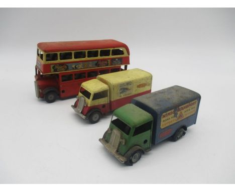 Three vintage Tri-ang Minic Toys clockwork tinplate vehicles including Putney London Transport bus, British Railways van &amp