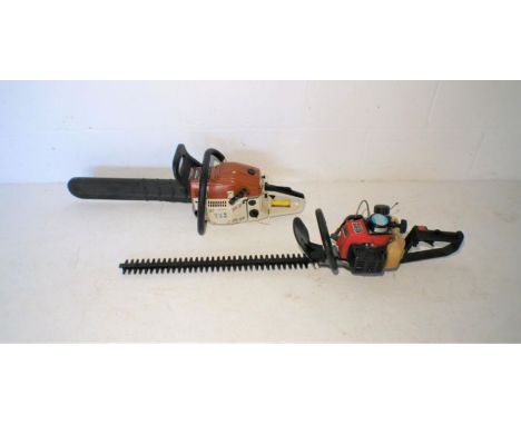 A Golden Star HT-670 hedge trimmer, along with a Neilsen gasoline chainsaw.