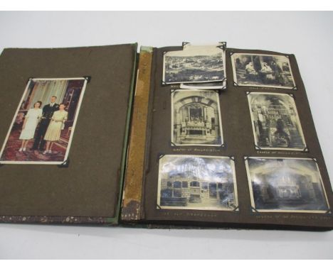 A vintage album of postcards, photographs etc.