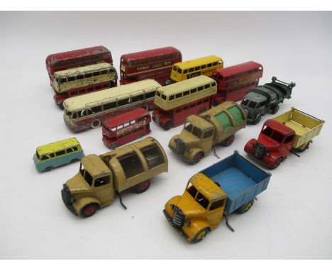 A collection of vintage playworn die-cast buses and trucks including Corgi Toys, Dinky, Lesney etc  