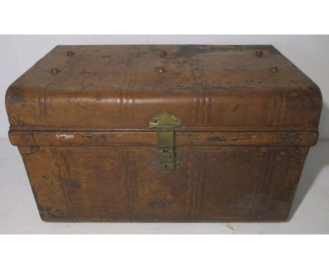 A vintage metal travel trunk with side handles and brass makers plate. 64cm x 40cm, height 39cm. 