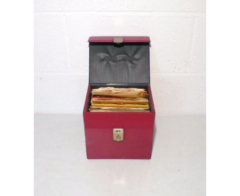 A quantity of 7" vinyl records, contained within a vintage carry case, including Slade, ABBA, Neil Diamond, Cliff Richard, Ju