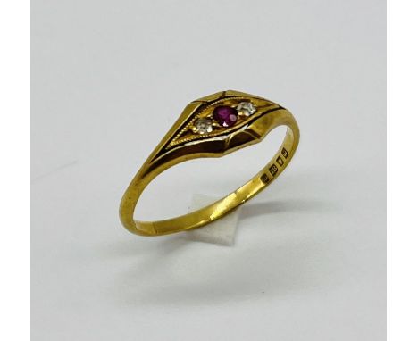 A Victorian 18ct gold ruby and diamond three stone ring