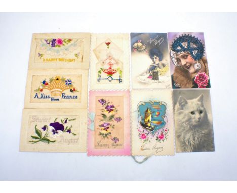 A small quantity of vintage postcards, including some embroidered. 