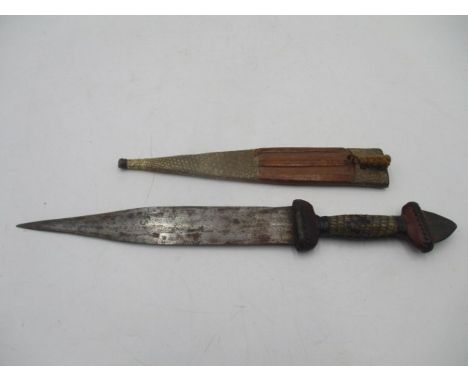 An African tribal dagger in leather and snakeskin sheath